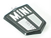 Badge MINI gris sur fond noir